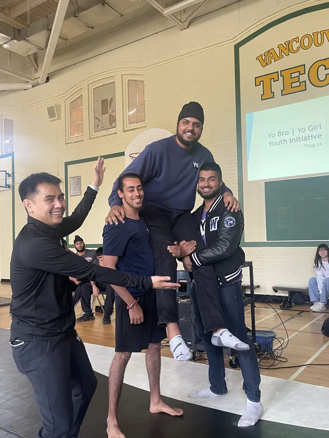 YBYG mentors and youth at a community program